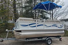 EP-14 Electric Pontoon Boat on a trailer