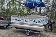 EP-14 Electric Pontoon Boat on a trailer